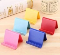 Stand plastico para Celular, tamaño 5.8 x 4.5 cmts