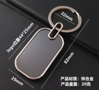 Llavero Metalico Rectangular con marco plateado e interior negro, 44 x 29 mm