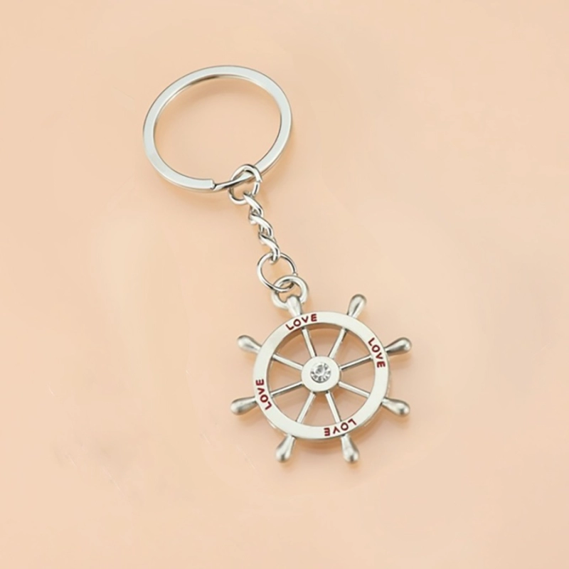 Llavero Metalico diseño Timon de Barco, tamaño 3.8 x 3.4 cmts