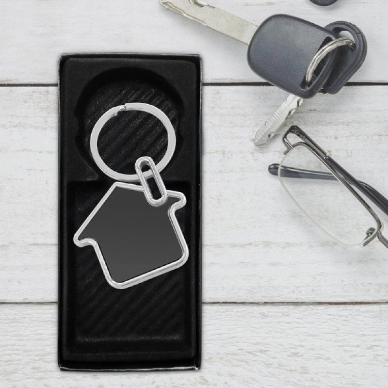 Llavero Home, metalico en forma de casa, de 3.5 x 3.4 cmts.